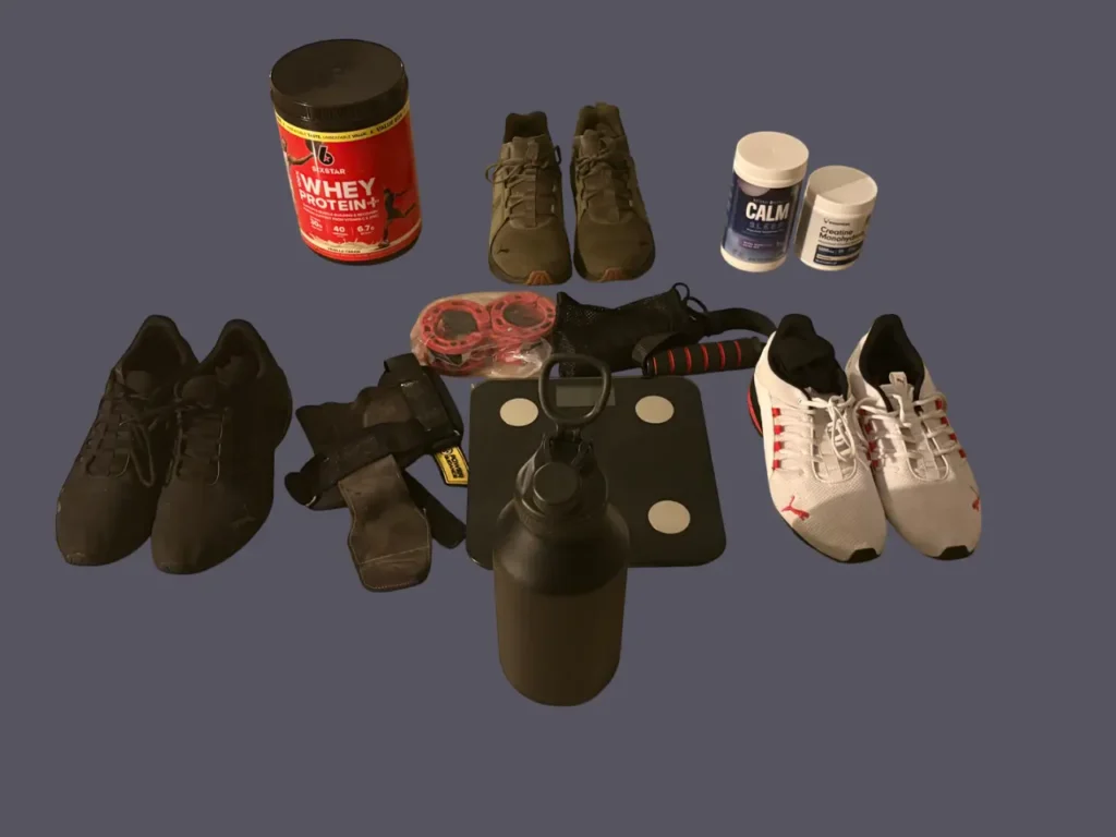 Mario McKenzie keto experiment morning setup showing scale, protein powder, creatine, workout shoes, gym gear, and magnesium supplements.